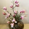 So chic and stylsh! Magnolia branches and succulent designed in a base