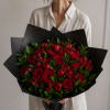 Designer&rsquo;s Choice arrangement inspired by a deep red palette, wrapped in black