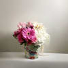Celebrate the woman who does it all with a lush, garden-inspired medley.