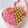 Elegant heart-shaped box featuring a half arrangement of premium pink roses and