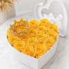 Luxury heart-shaped box filled with premium yellow roses, beautifully arranged for a