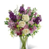 Creamy white roses set against a wash of lavender, purple and pink