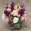 Pink roses, white carnations, alstroemeria, pink mini carnations, lavender cushion mum, with