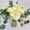 Simple elegance with fresh Hydrangeas accented with Eucalyptus is represented! Delivered in