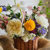 An upscale Mother&rsquo;s Day flower basket filled with locally grown blooms in
