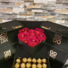Black gift boxes with red roses and gold-wrapped chocolates