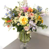 This vibrant and cheerful arrangement is a "Sunshine &amp; Wildflowers" Garden Bouquet.