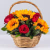 Basket of red roses and yellow sunflowers