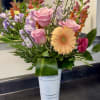 Celebrate Mom with a vibrant mix of fresh spring flowers in full