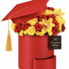 Bright red and gold roses burst from a graduation cap-shaped box, making