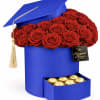 A bold blue graduation cap box crowned with a dense band of