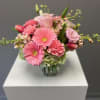 Pink mixed bouquet in a clear glass vase