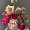 Large blush and hot-pink peonies steal the show in this spring-ready flower