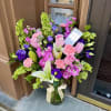 Large, lush bouquet of pink roses, white lilies, pink carnations , 