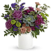 Mixed bouquet in a white vase with purple, pink, and green blooms