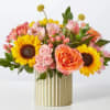 A combination as sweet as citrus, these peach, orange and yellow blooms