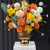 Warm, celebratory color takes center stage in this orange, yellow, and peach
