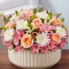 EXCLUSIVE An exquisite gift with garden-inspired style. Our blush-colored gathering of blooms