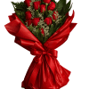A bouquet of velvety red roses wrapped in red makes a bold
