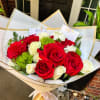 A timeless bouquet featuring 10 premium red roses and 10 elegant white