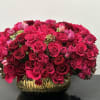 A love affair of Fushia and red roses infusing a melody of