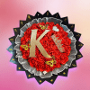 Red rose bouquet with a gold letter K and butterfly decorations
