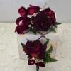Deep burgundy (wine) roses with white and green accents, velvet ribbon loops
