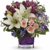 Va-va-bloom! This grand array of purple hydrangea, light pink spray roses and