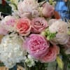 Pink and white mixed bouquet in a clear glass vase