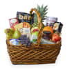 Gift basket with fruit, snacks, and a pineapple centerpiece