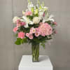 &ldquo;Pink Whisper&rdquo; is soft and effortlessly elegant. Fluffy pink and white hydrangeas
