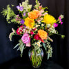 This arrangement represents the signature style of Buds Blooms &amp; Bad Asses