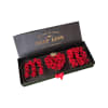 A dramatic boxed rose arrangement that spells out "I LOVE YOU" with