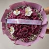 A lush, round Mother's Day flower arrangement that reads like a love