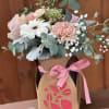 Beautifully arranged roses, natural carnations , gerber daisies and mini carnations 