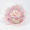 Pink and white rose bouquet with a Happy Valentine's Day ribbon
