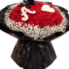 Red rose bouquet with white floral lettering and a black ribbon wrap