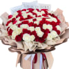 Bouquet of red and white roses with a pearl strand and love cards
