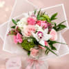 A soft, feminine arrangement that reads as both elegant and affectionate-the Mother's