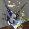 Stunning ceramic vase of Delphinium, and other mixed flowers