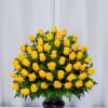 A glowing cluster of bright yellow roses creates immediate warmth-perfect as a