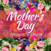 A bright and cheery Mother's Day bouquet. Designers choice flowers with only