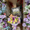 Bursting with jubilant color and celebratory flair, this graduation flower arrangement is
