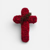 Red rose cross-shaped floral arrangement on a white background
