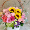 A bright and cheerful flower arrangement in San Antonio featuring fresh sunflowers