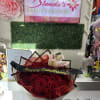 Red roses with a beautiful lily centerpiece 
Standard size 25 roses 1