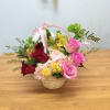 Bright and cheerful, this Mom pretty flower arrangement is a colorful basket