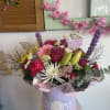 Full mixed pink, white, purple, and yellow blooms - roses, gerbera, lilies