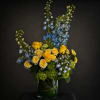 A fresh and airy design featuring a graceful, asymmetrical silhouette that draws