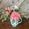 A sweet little cup filled with love  Designed in a vintage-inspired